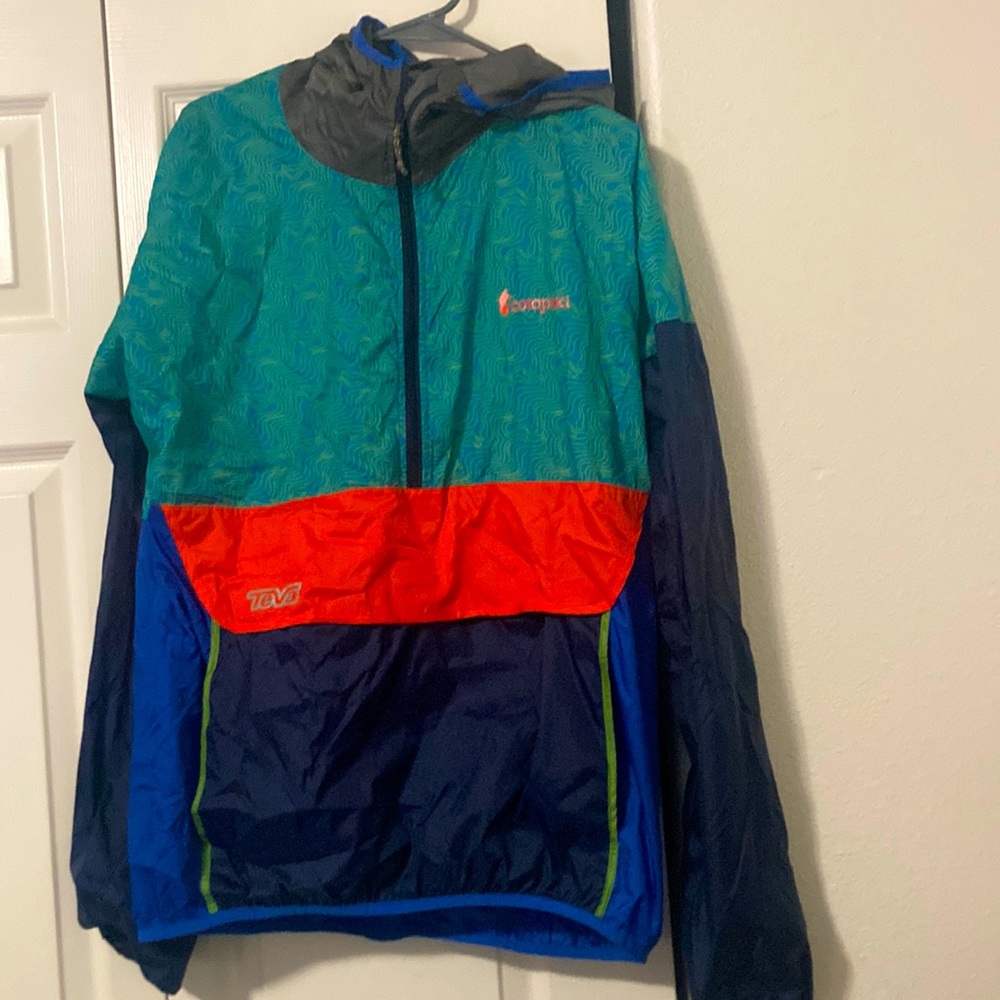 Size xl women Cotopaxi. Teal orange and blue. Teva design. Windbreaker/running